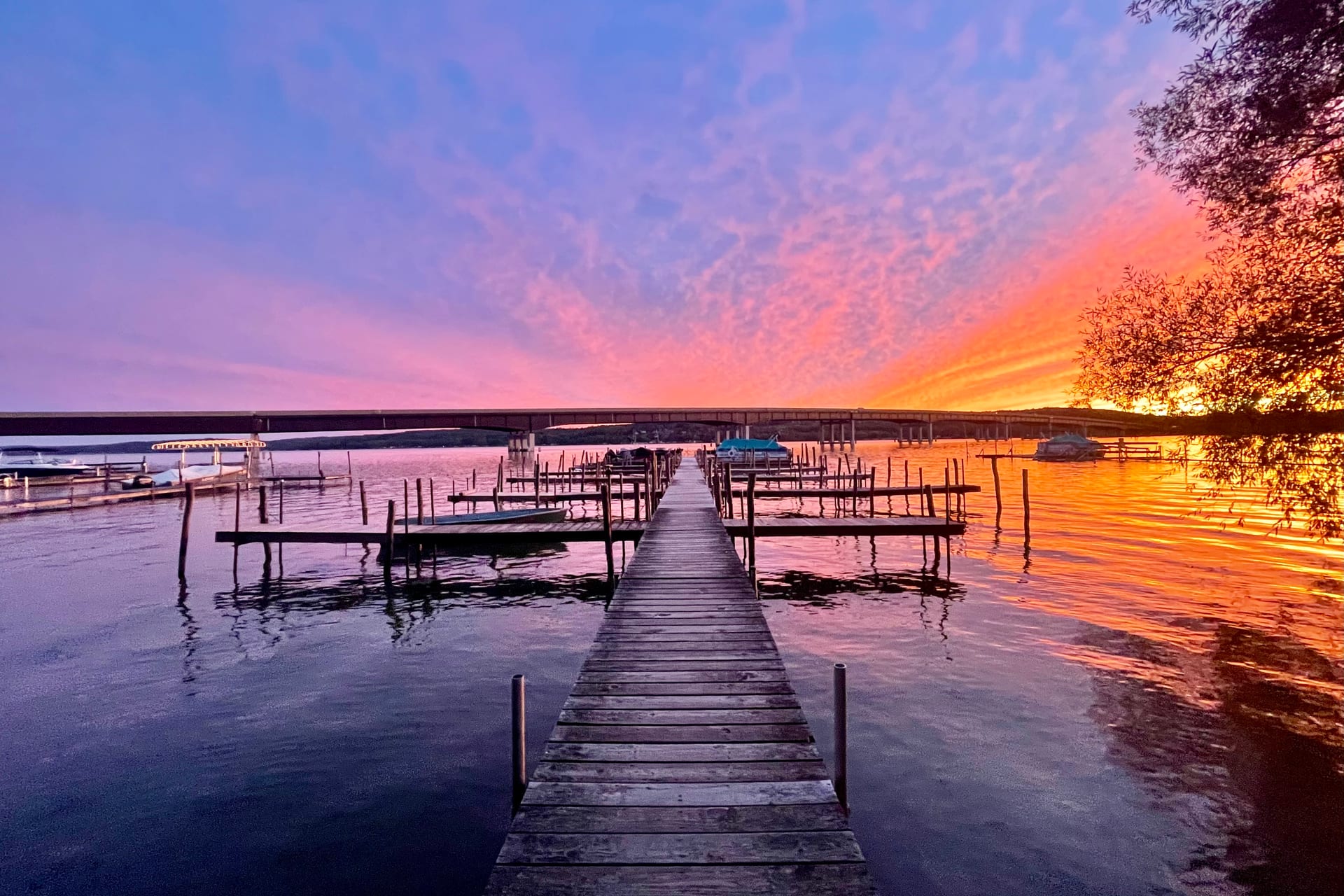 Sunset over the dock and Chautauqua Lake at Bemus Point Lodge